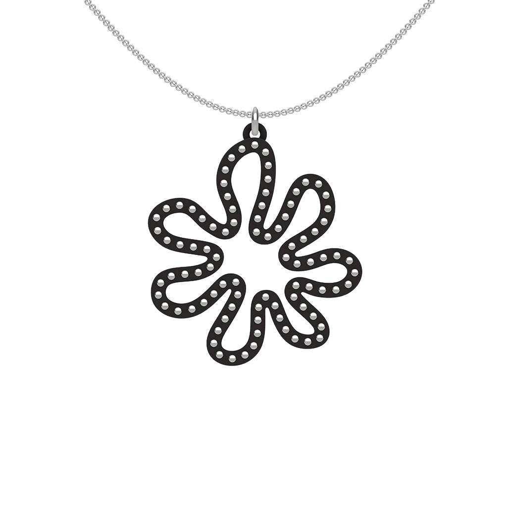 MATISSE.cutout  CORAL pendant  STYLE:  2  with sterling silver studs along shape  COLOR:  black    MATERIAL:  3D printed Nylon  ARTIST:  Ree Gallagher, USA