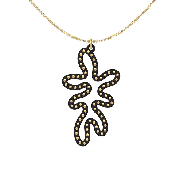 MATISSE.cutout  CORAL pendant  STYLE:  5   vertical coral shape  with 14/20 goldfill studs along shape  COLOR:   black    MATERIAL:  3D printed Nylon  ARTIST:  Ree Gallagher, USA