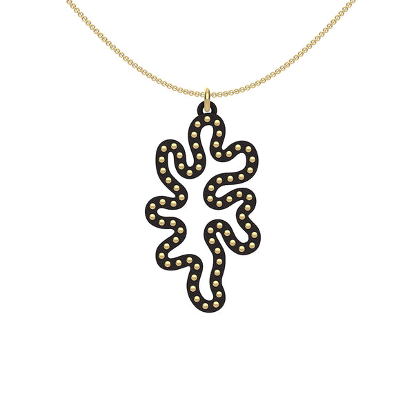 MATISSE.cutout CORAL pendant STYLE: 1 with 14/20 goldfill studs along shape COLOR: black MATERIAL: 3D printed Nylon ARTIST: Ree Gallagher, USA