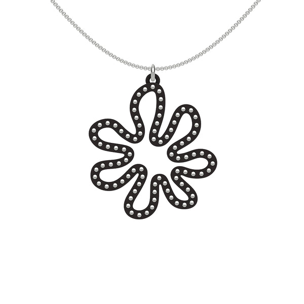 MATISSE.cutout  CORAL pendant  STYLE:  2  with sterling silver studs along shape  COLOR:  black    MATERIAL:  3D printed Nylon  ARTIST:  Ree Gallagher, USA