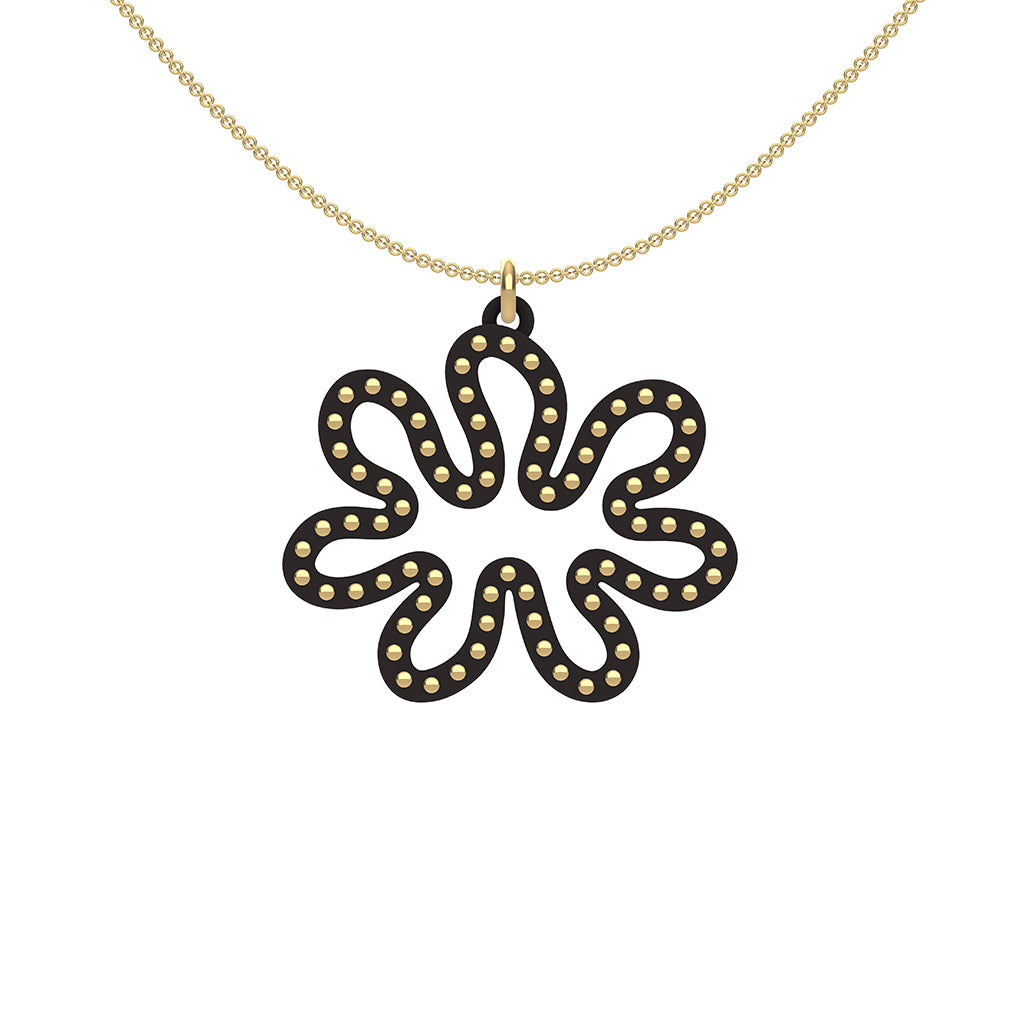 MATISSE.cutout  CORAL pendant  STYLE:  3 , oriented horizontally with 14/20  goldfill  studs along shape  COLOR:  black  MATERIAL:  3D printed Nylon  ARTIST:  Ree Gallagher, USA