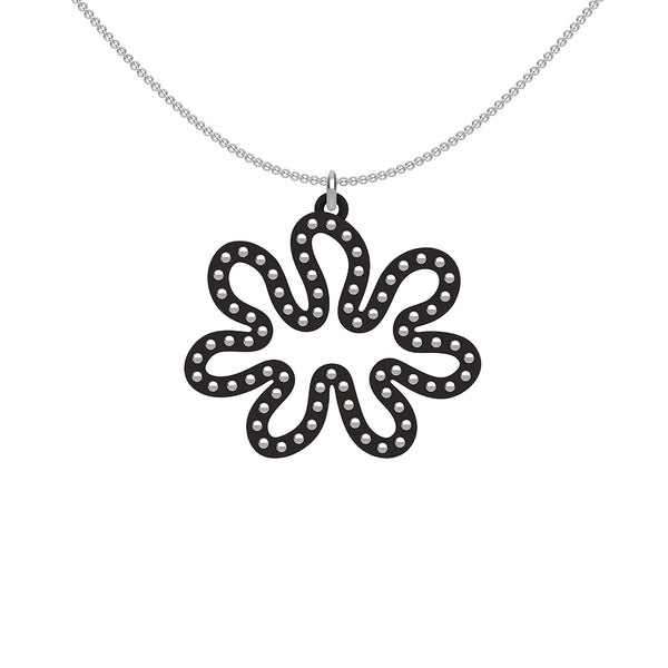 MATISSE.cutout  CORAL pendant  STYLE:  3 , oriented horizontally with sterling silver studs along shape  COLOR:  black   MATERIAL:  3D printed Nylon  ARTIST:  Ree Gallagher, USA