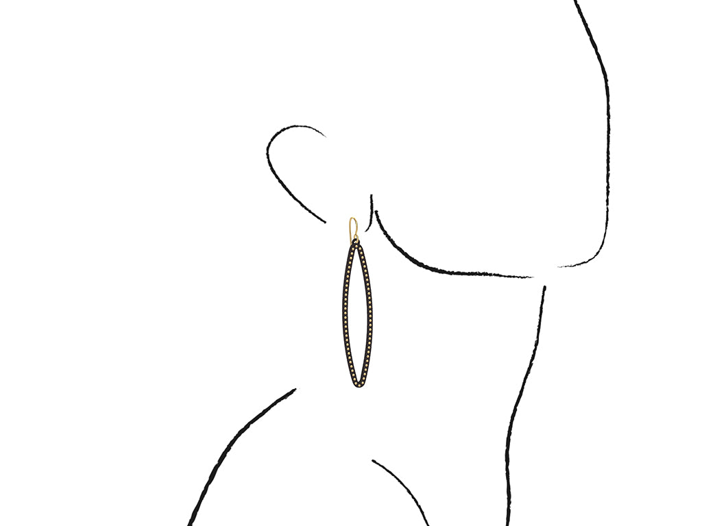 ON MODEL:  OVAL earrings  SIZE:  LARGE  ( 2.75 inches long)  with  14/20  goldfill  studs along shape  COLOR: black  MATERIAL: 3D printed Nylon  ARTIST: Ree Gallagher