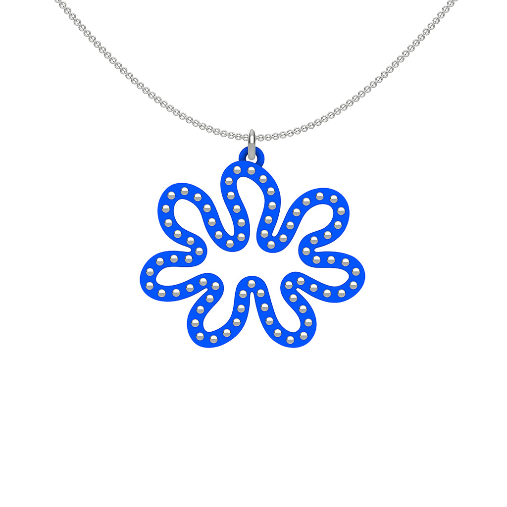 MATISSE.cutout  CORAL pendant  STYLE:  3 , oriented horizontally with sterling silver studs along shape  COLOR:  royal blue    MATERIAL:  3D printed Nylon  ARTIST:  Ree Gallagher, USA