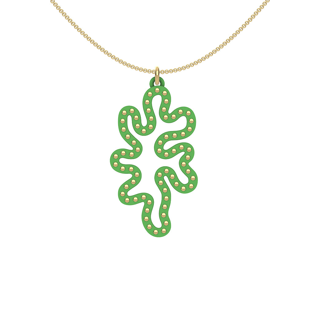 MATISSE.cutout  CORAL pendant  STYLE:  1  with 14/20 goldfill studs along shape  COLOR:  grass green    MATERIAL:  3D printed Nylon  ARTIST:  Ree Gallagher