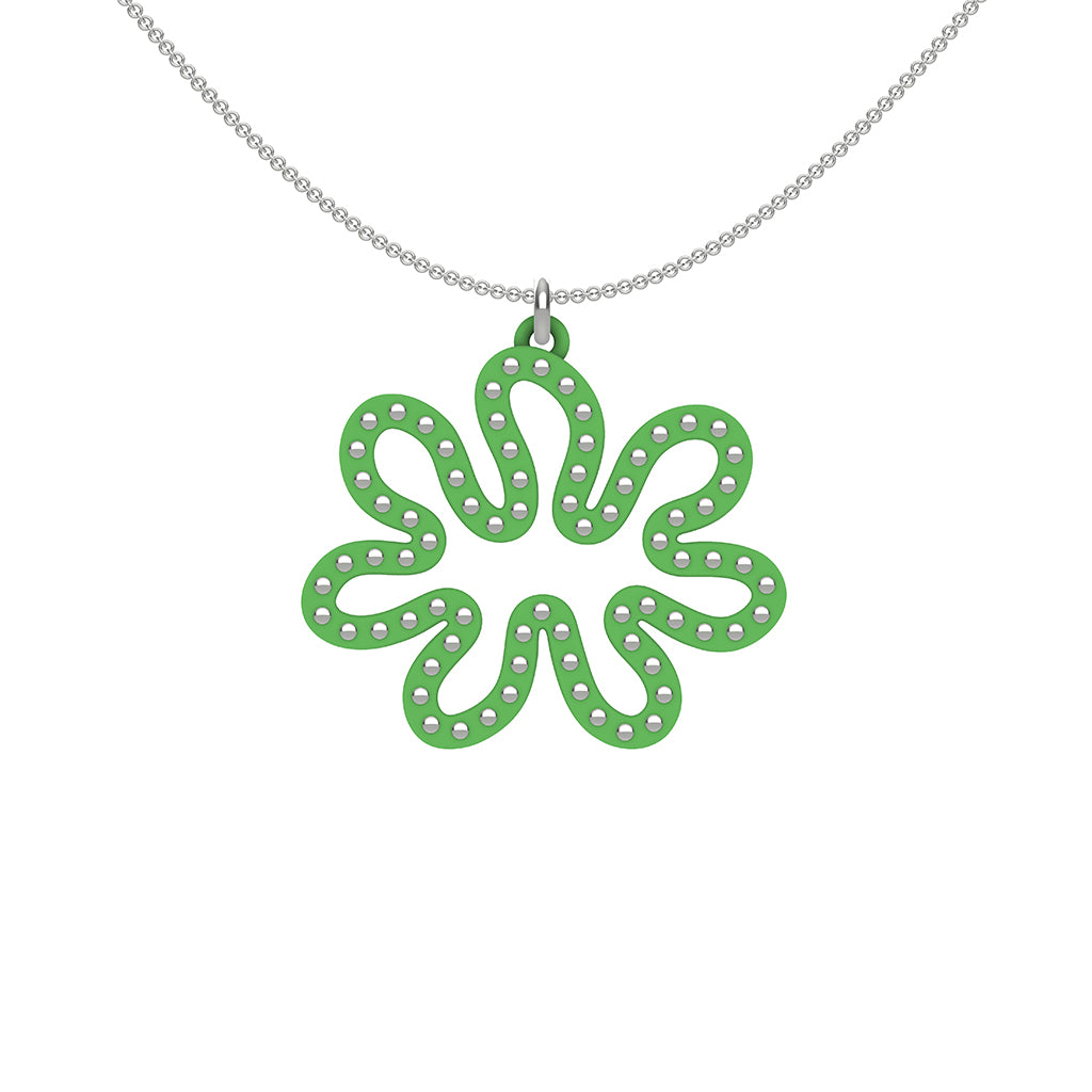 MATISSE.cutout  CORAL pendant  STYLE:  3 , oriented horizontally with sterling silver studs along shape  COLOR:  grass  green    MATERIAL:  3D printed Nylon  ARTIST:  Ree Gallagher, USA