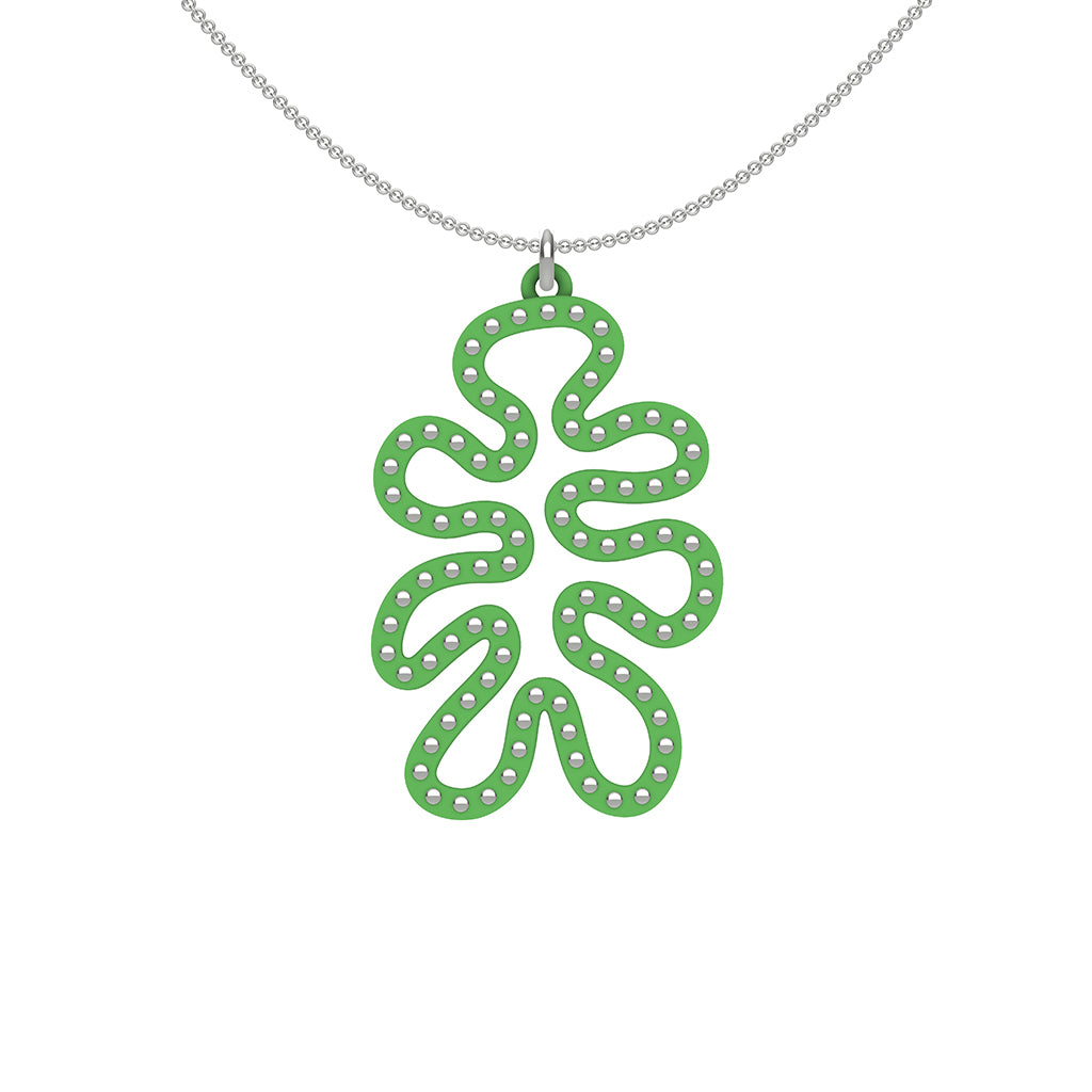 MATISSE.cutout  CORAL pendant  STYLE:  4 , funky vertical shape  with sterling studs along shape  COLOR:   grass green    MATERIAL:  3D printed Nylon  ARTIST:  Ree Gallagher, USA