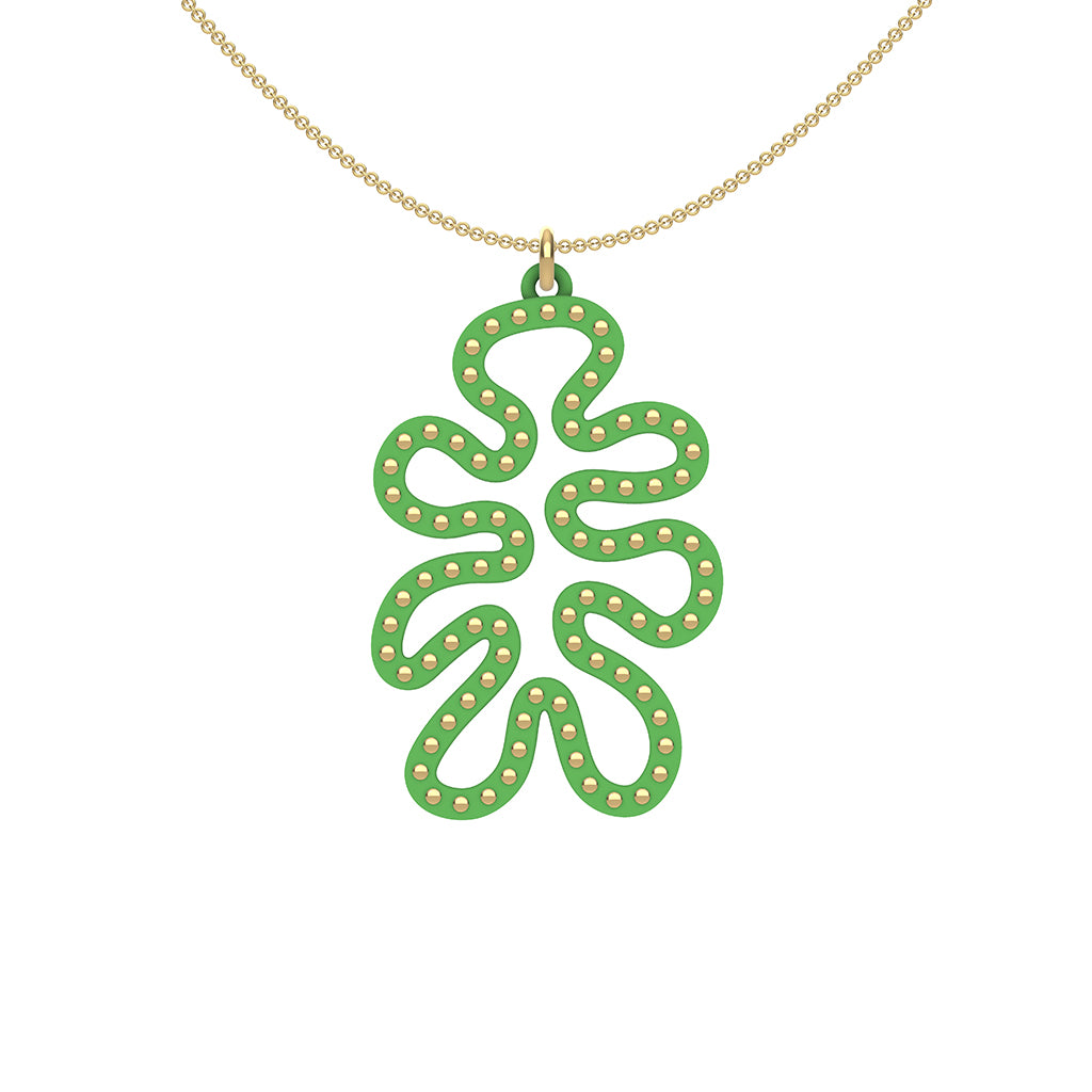 MATISSE.cutout  CORAL pendant  STYLE:  4 , funky vertical shape  with 14/20 goldfill studs along shape  COLOR:   grass green    MATERIAL:  3D printed Nylon  ARTIST:  Ree Gallagher, USA