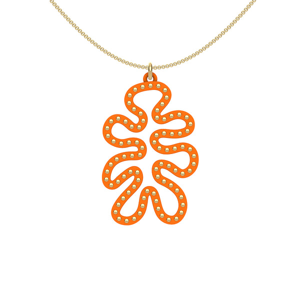 MATISSE.cutout  CORAL pendant  STYLE:  4 , funky vertical shape  with 14/20 goldfill studs along shape  COLOR:   orange    MATERIAL:  3D printed Nylon  ARTIST:  Ree Gallagher, USA