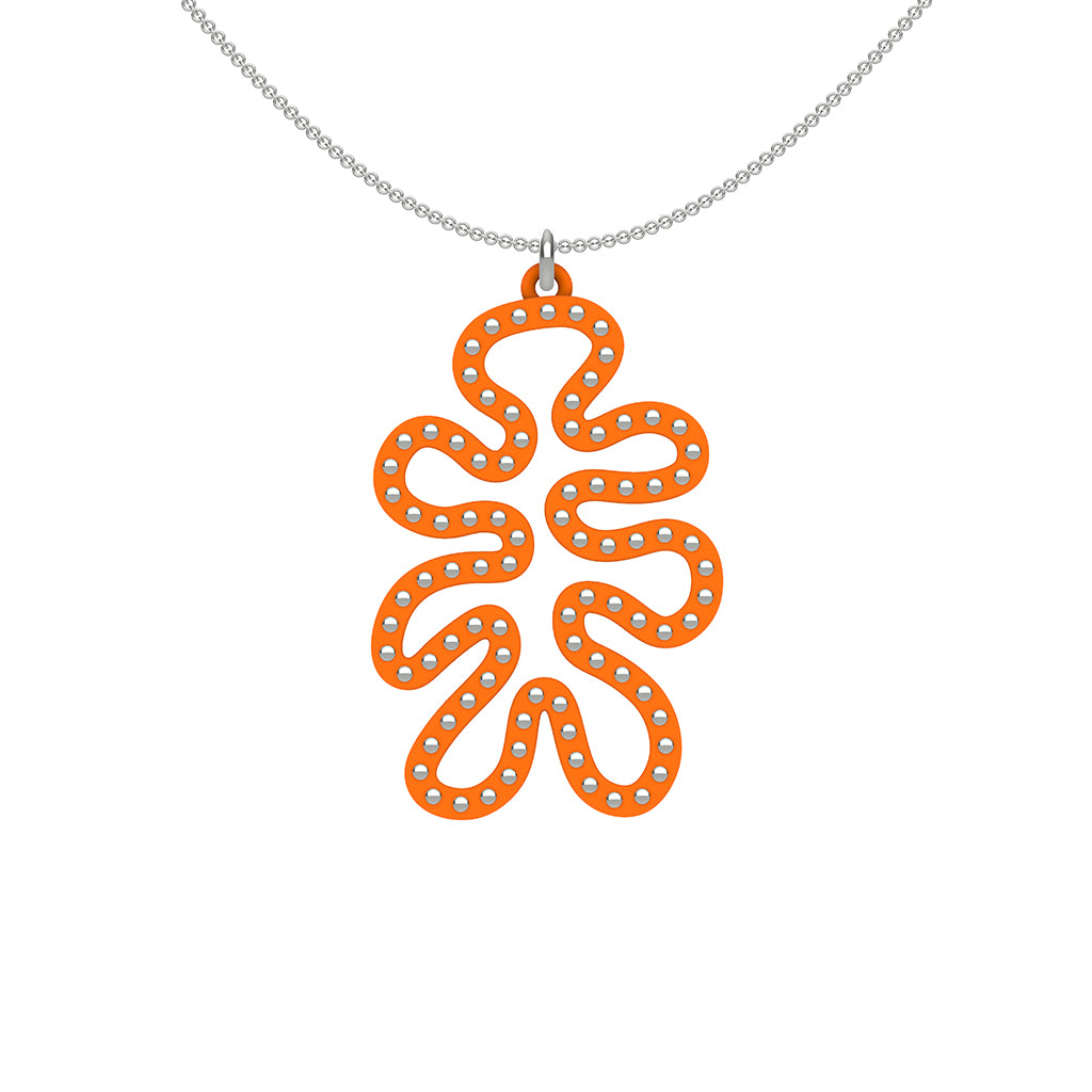MATISSE.cutout  CORAL pendant  STYLE:  4 , funky vertical shape  with sterling  studs along shape  COLOR:   orange    MATERIAL:  3D printed Nylon  ARTIST:  Ree Gallagher, USA