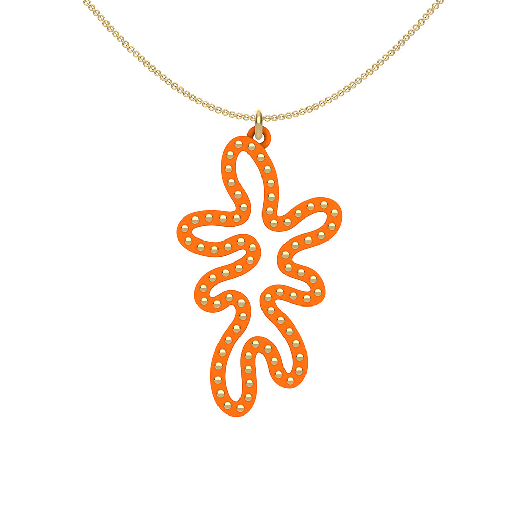 MATISSE.cutout  CORAL pendant  STYLE:  5   vertical coral shape  with 14/20 goldfill  studs along shape  COLOR:   orange    MATERIAL:  3D printed Nylon  ARTIST:  Ree Gallagher, USA