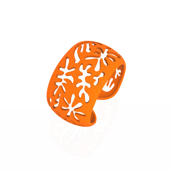 CORAL cutout CUFF bracelet inspired by artist Henri Matisse.  Color is  ORANGE.  Measures 1.5 inches wide.  ONE SIZE fits most .  Made of lightweight nylon