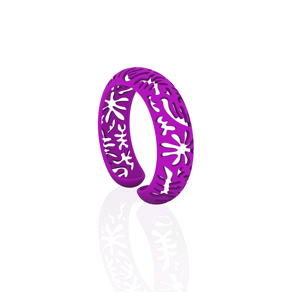 CORAL cutout CUFF bracelet inspired by artist Henri Matisse.  Color is  PURPLE  Measures 3/4 of inches wide.  ONE SIZE fits most .  Made of lightweight nylon