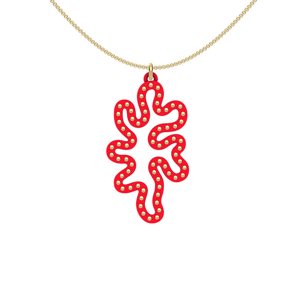 MATISSE.cutout  RED CORAL pendant  STYLE:  1  with 14/20 goldfill studs along shape     MATERIAL:  3D printed Nylon  ARTIST:  Ree Gallagher