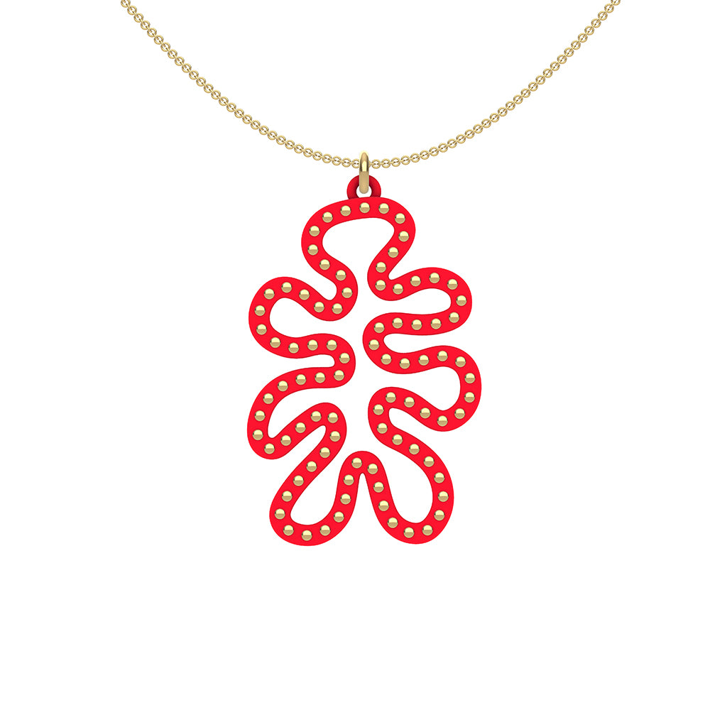 MATISSE.cutout  CORAL pendant  STYLE:  4 , funky vertical shape  with 14/20 goldfill studs along shape  COLOR:   red    MATERIAL:  3D printed Nylon  ARTIST:  Ree Gallagher, USA
