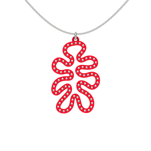 MATISSE.cutout  CORAL pendant  STYLE:  4 , funky vertical shape  with sterling studs along shape  COLOR:   red    MATERIAL:  3D printed Nylon  ARTIST:  Ree Gallagher, USA