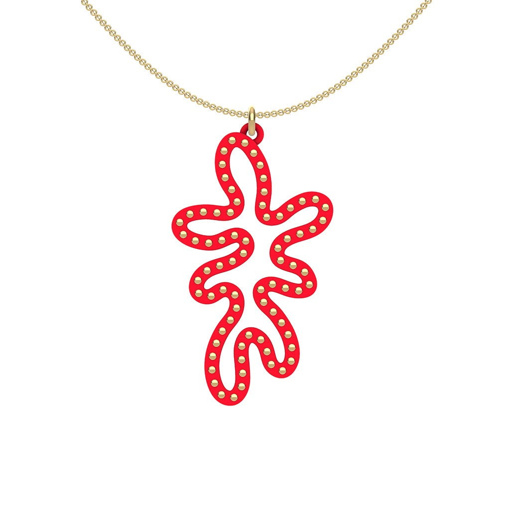 MATISSE.cutout  CORAL pendant  STYLE:  5   vertical coral shape  with 14/20 goldfill  studs along shape  COLOR:   red    MATERIAL:  3D printed Nylon  ARTIST:  Ree Gallagher, USA