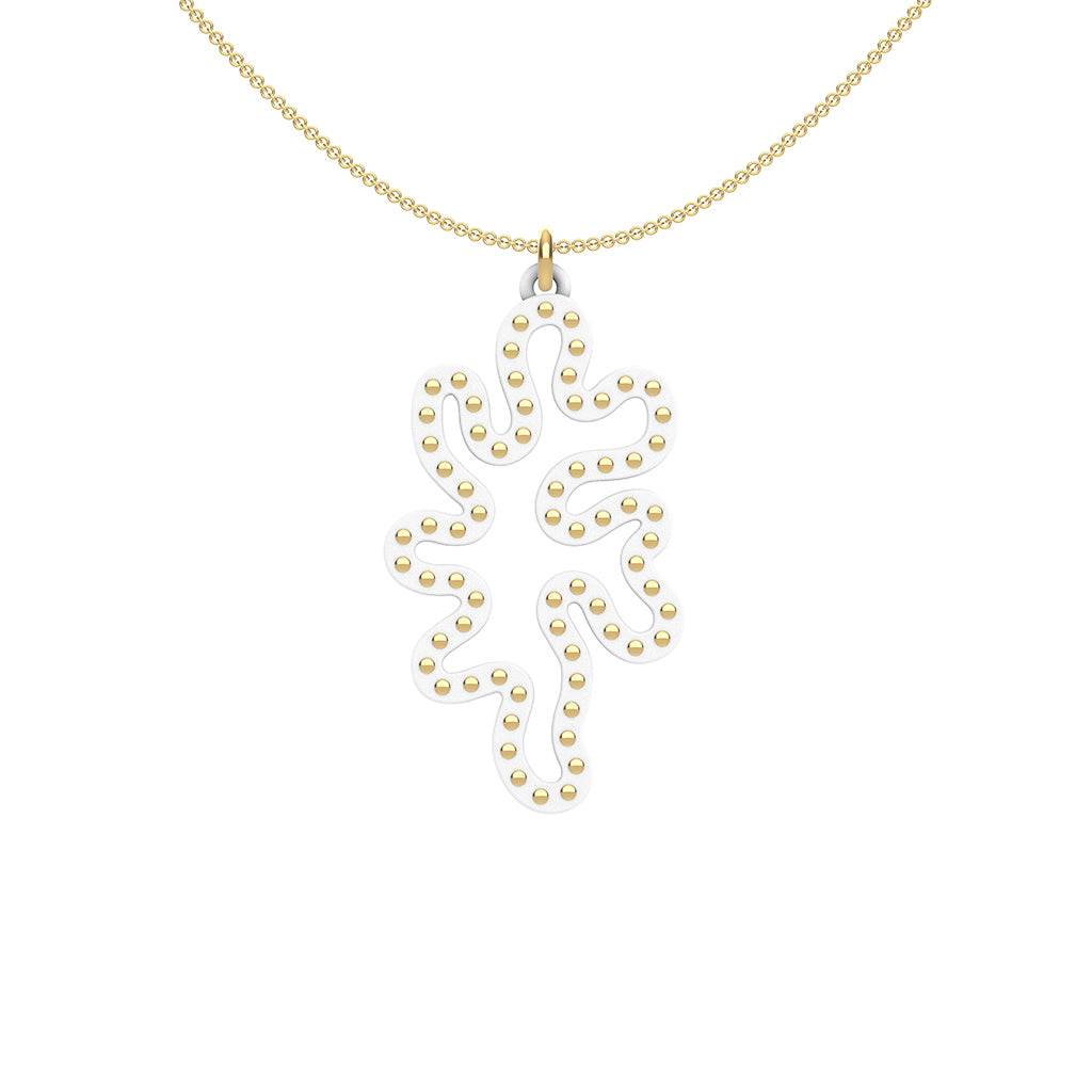 MATISSE.cutout  CORAL pendant  STYLE:  1  with 14/20 goldfill studs along shape COLOR:  black  MATERIAL:  3D printed Nylon  ARTIST:  Ree Gallagher