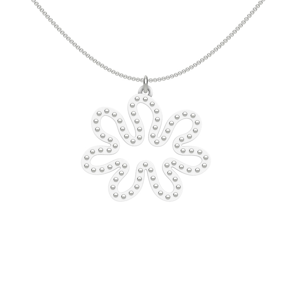 MATISSE.cutout  CORAL pendant  STYLE:  3 , oriented horizontally with sterling silver studs along shape  COLOR:   white    MATERIAL:  3D printed Nylon  ARTIST:  Ree Gallagher, USA