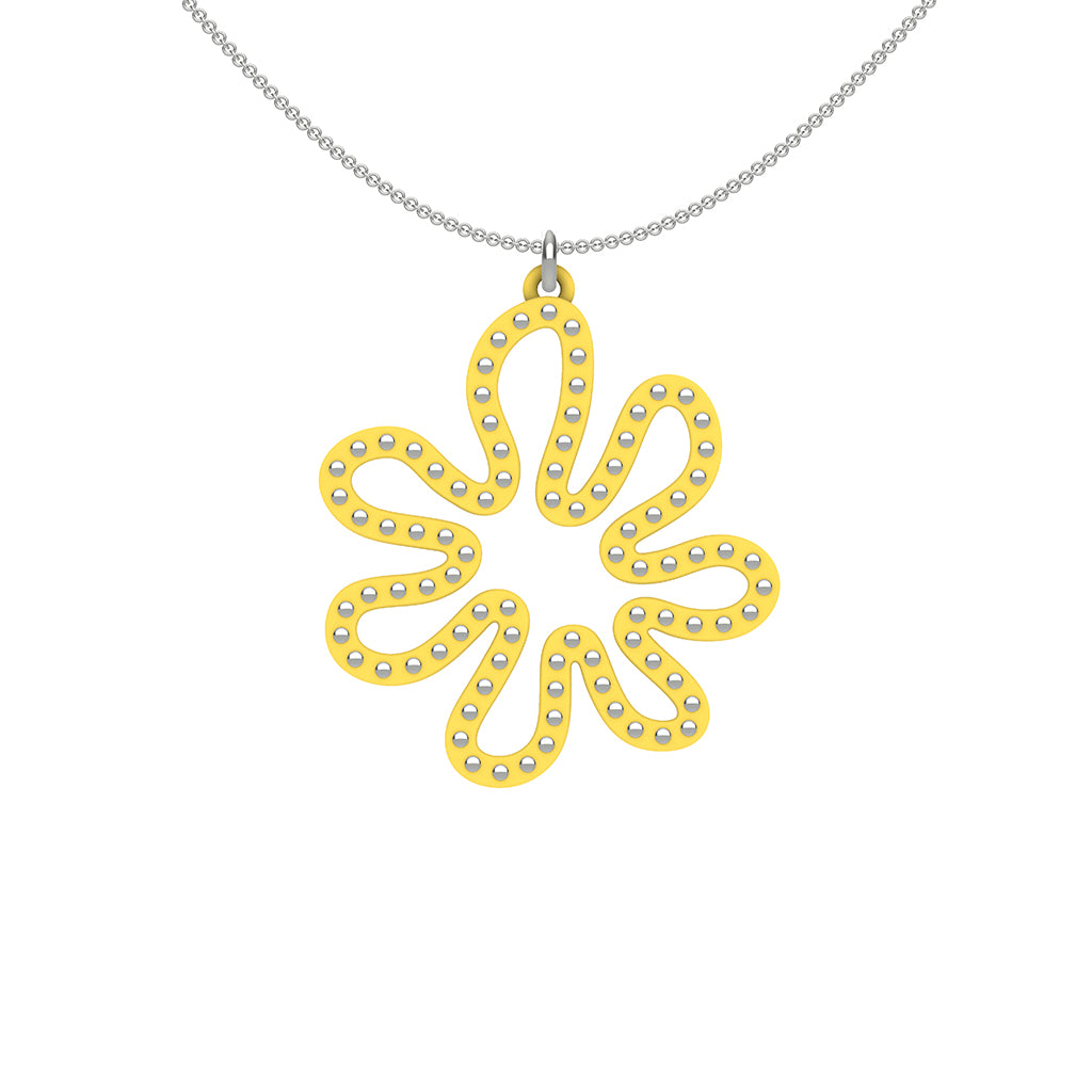 MATISSE.cutout  CORAL pendant  STYLE:  2  with MATISSE.cutout  CORAL pendant  STYLE:  2  with sterling studs along shape  COLOR:  yellow    MATERIAL:  3D printed Nylon  ARTIST:  Ree Gallagher, USA