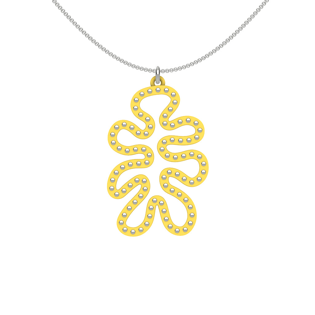MATISSE.cutout  CORAL pendant  STYLE:  4 , funky vertical shape  with sterling  studs along shape  COLOR:   yellow    MATERIAL:  3D printed Nylon  ARTIST:  Ree Gallagher, USA